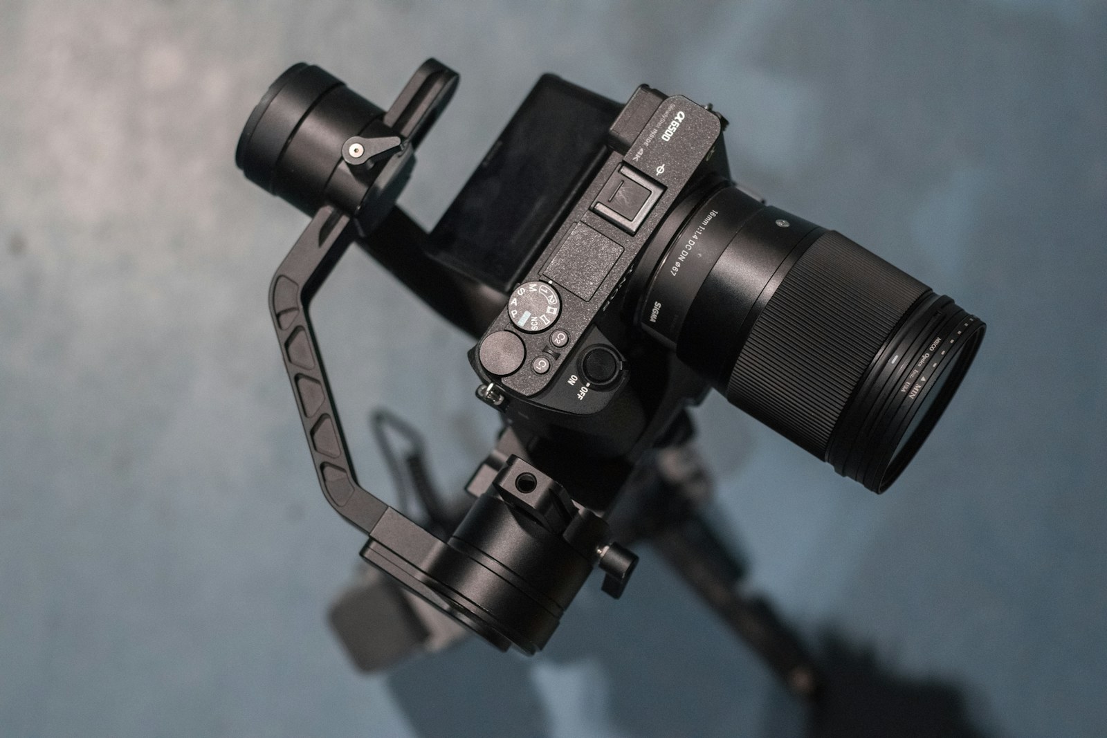 Professional videographer operating a camera for a commercial production