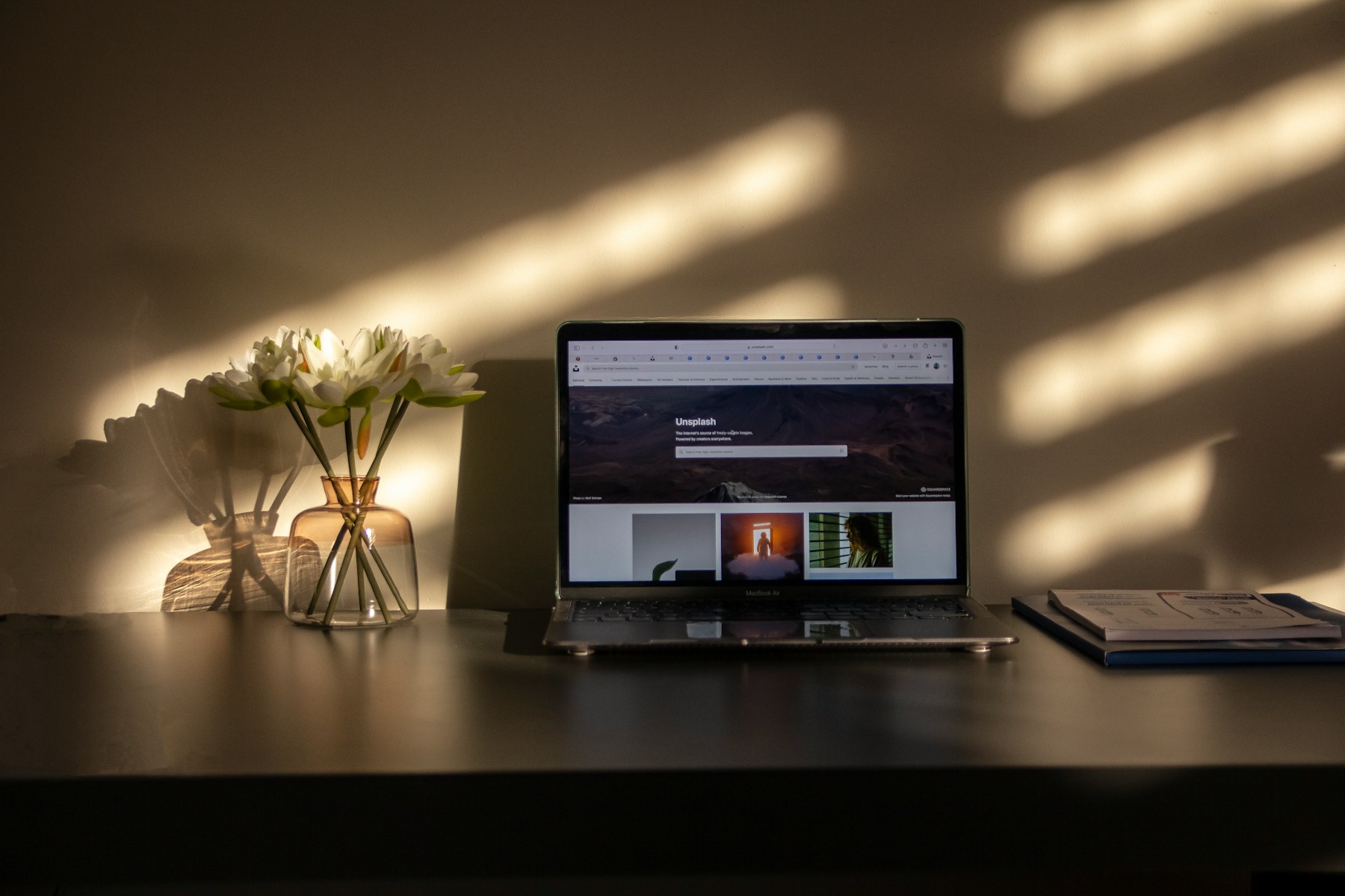 Modern laptop workspace representing web design, hosting and website management